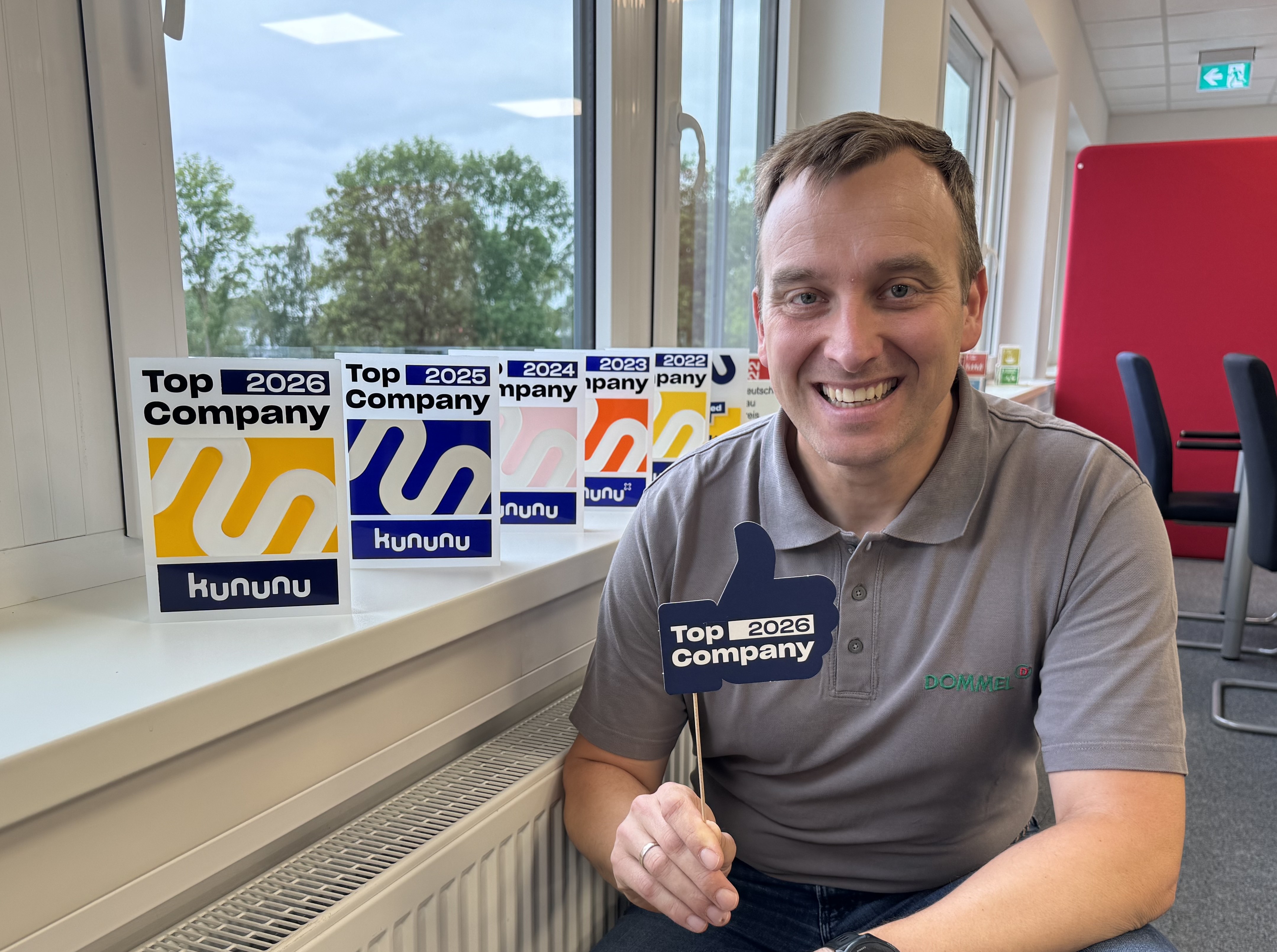 Freude über Award Benedikt freut sich über Kununu Top Company